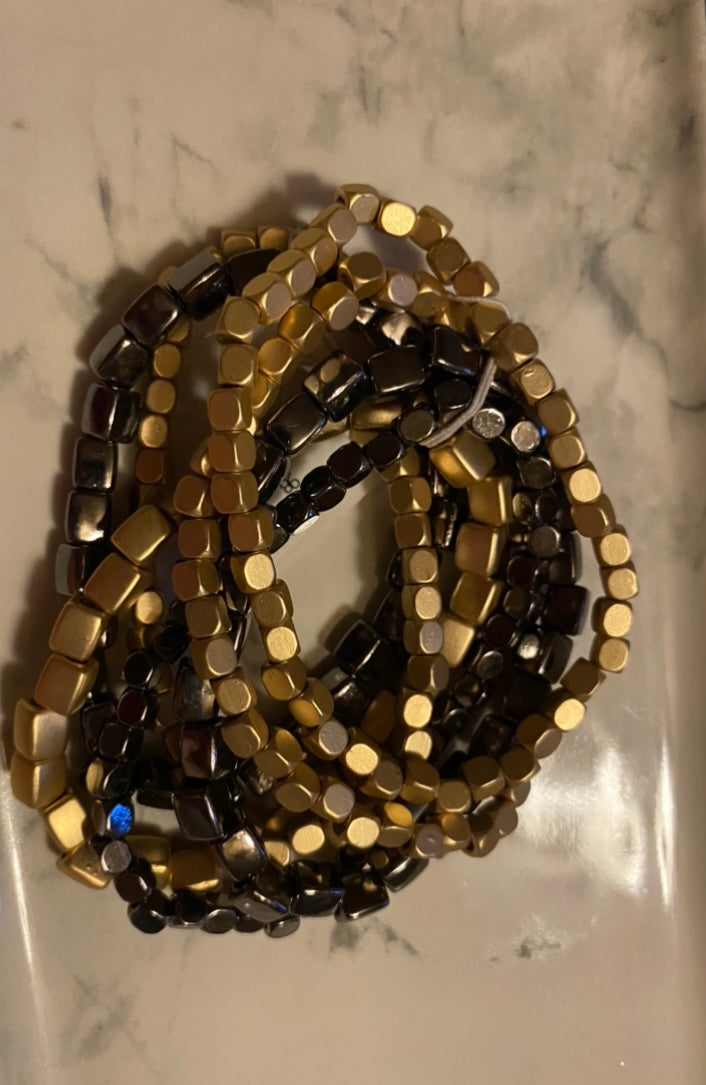 Black and Gold Metal Bracelets